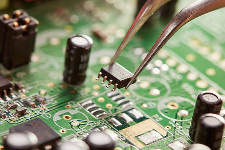 image of a ic board repair in instruments care electronic lab